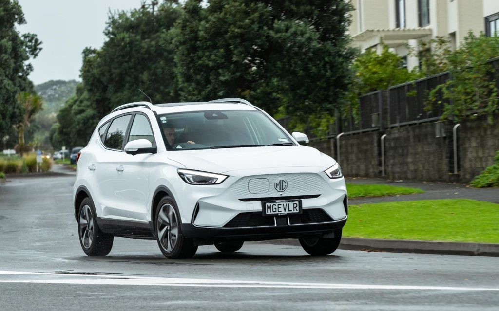 MG ZS EV driving on wet road