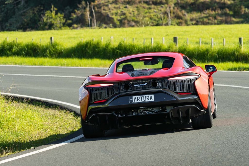 Rear shot of the McLaren Artura taking a corner