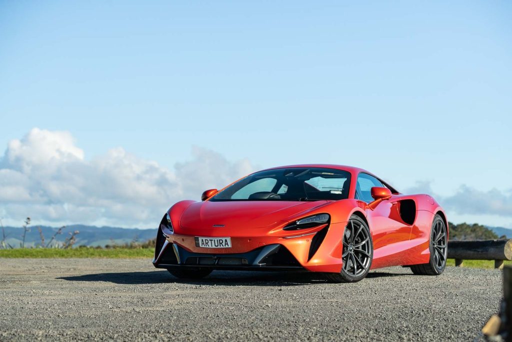 McLaren Artura parked out in the sun, front quarter shot