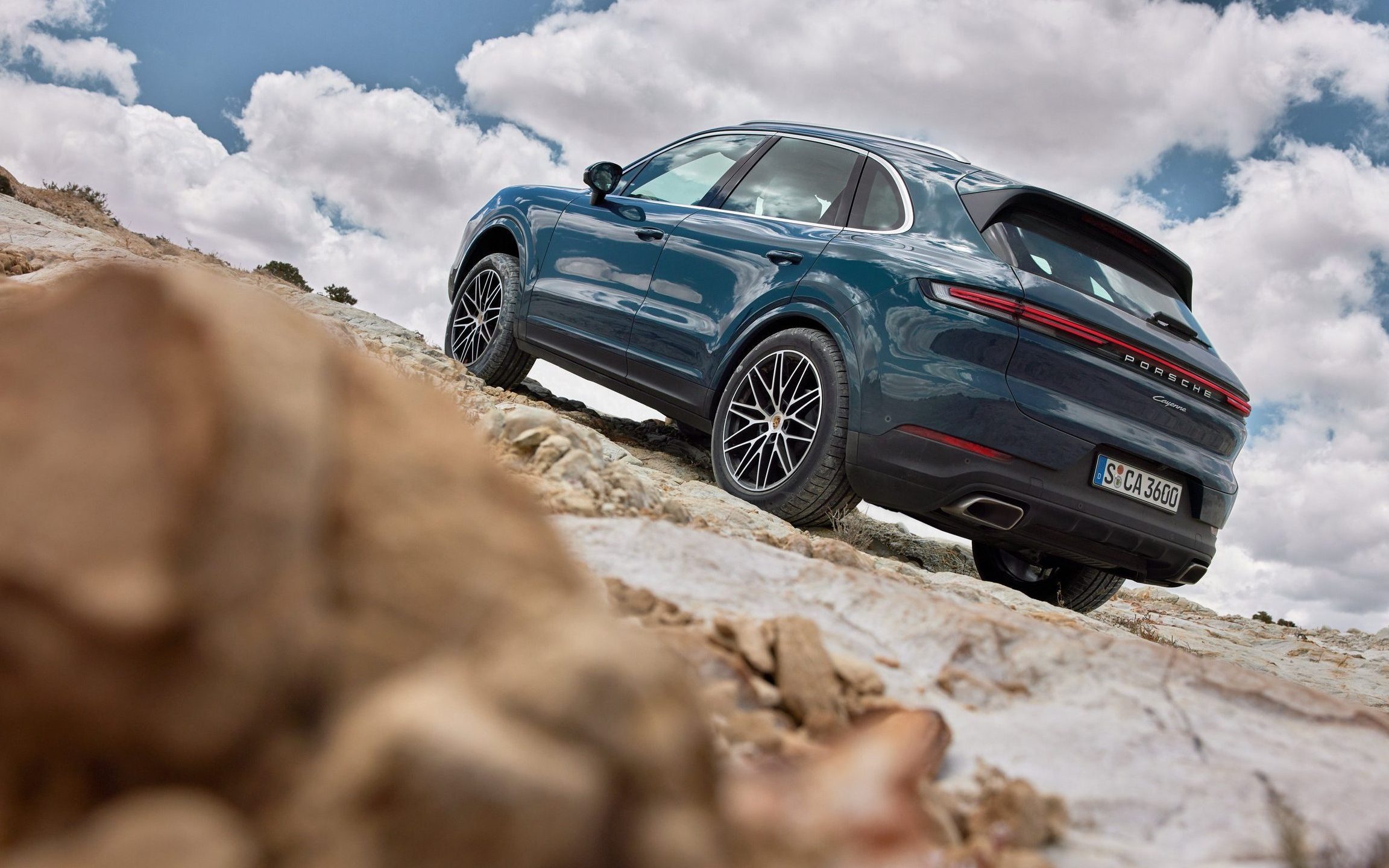 2024 Porsche Cayenne parked on dirt