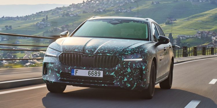 Skoda Superb driving along mountain road