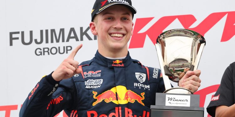 Liam Lawson holding winning trophy at Fuji Speedway Super Formula round 2023