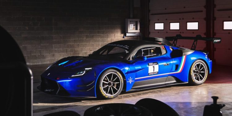 Maserati GT2 parked in pit garage at race track