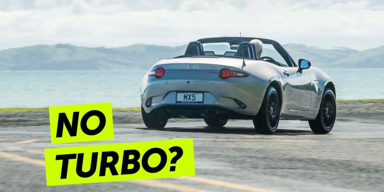 Mazda MX-5 GT driving around corner by sea