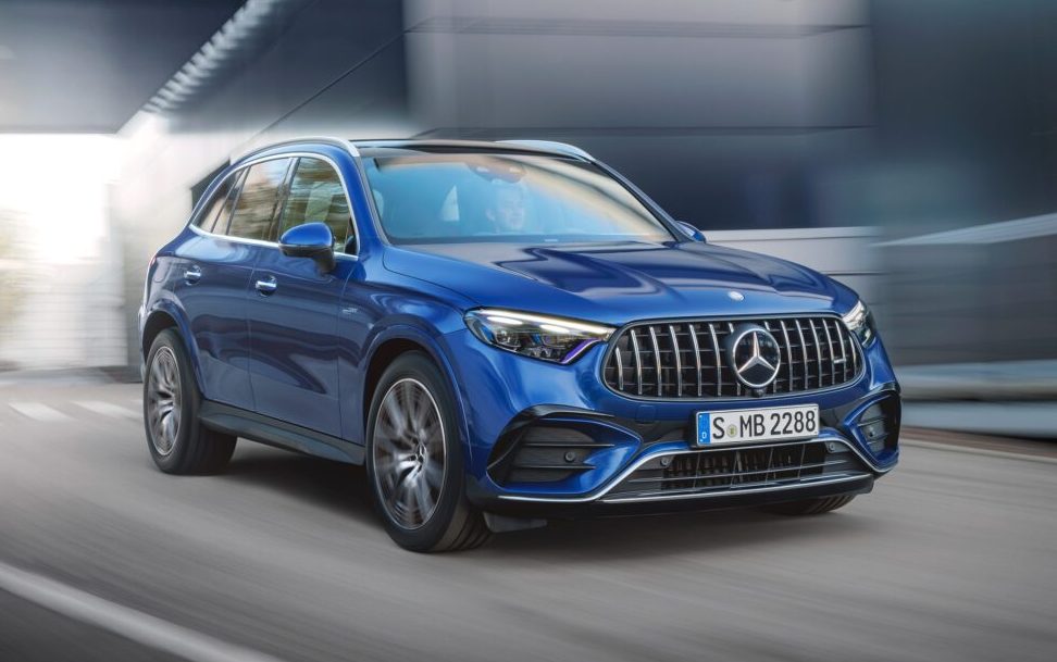Mercedes-AMG GLC 43 driving past factory