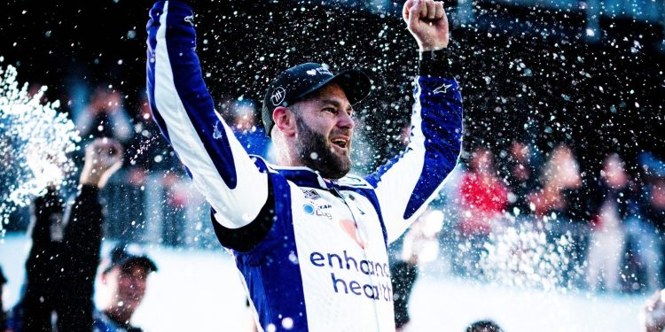 Shane van Gisbergen celebrating NASCAR debut win