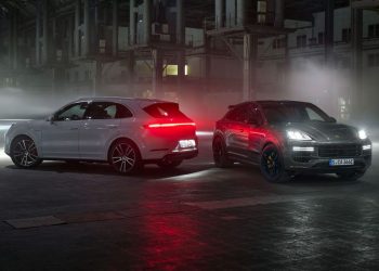 Porsche Cayenne Turbo E-Hybrid SUV and Coupe parked next to each other