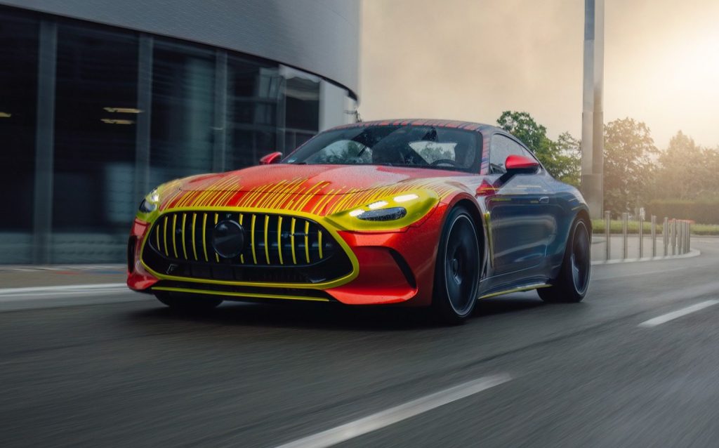 2024 Mercedes-AMG in camouflage driving on road 