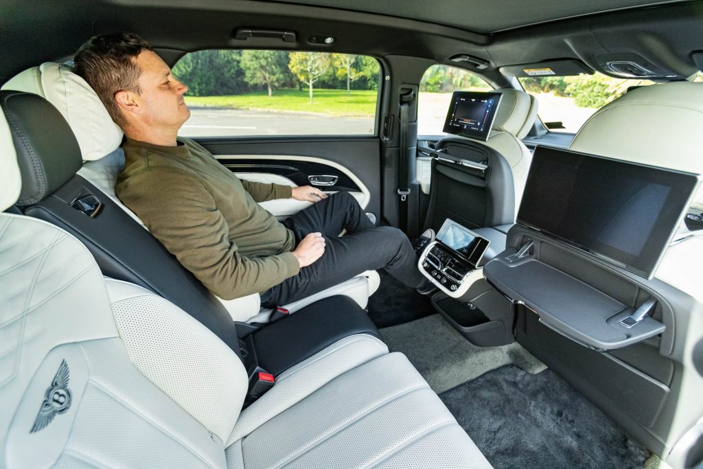 Kyle Cassidy relaxes in the Bentley EWB's airline seats