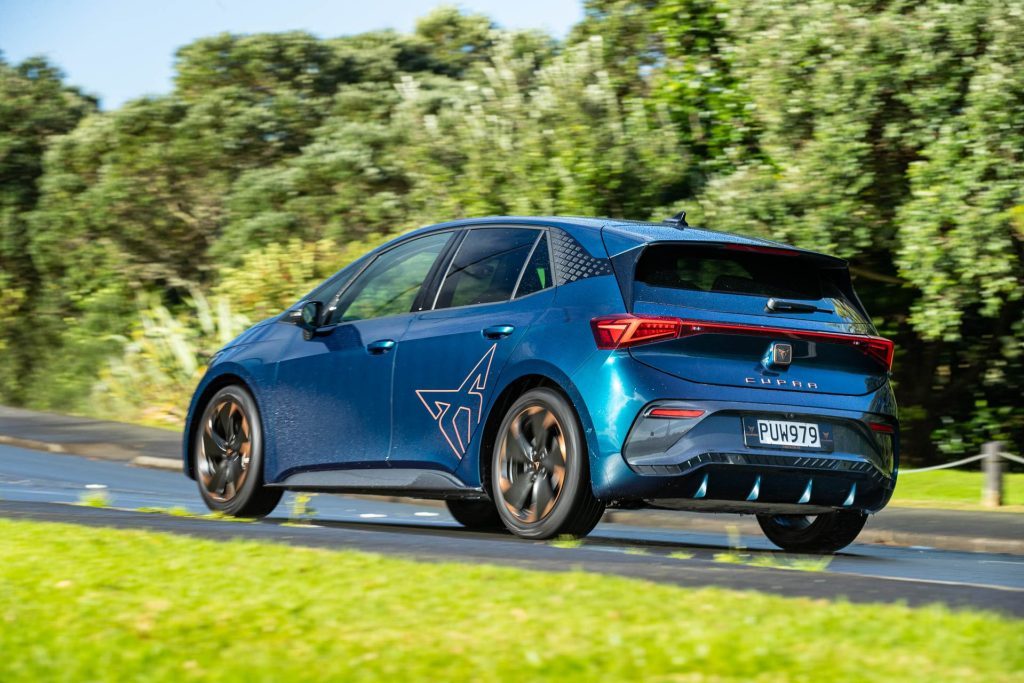 Cupra Born V+ driving up a hill