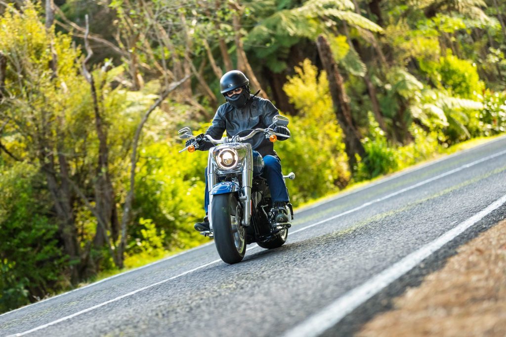 Harley-Davidson Fat Boy 114 driving on a forest road