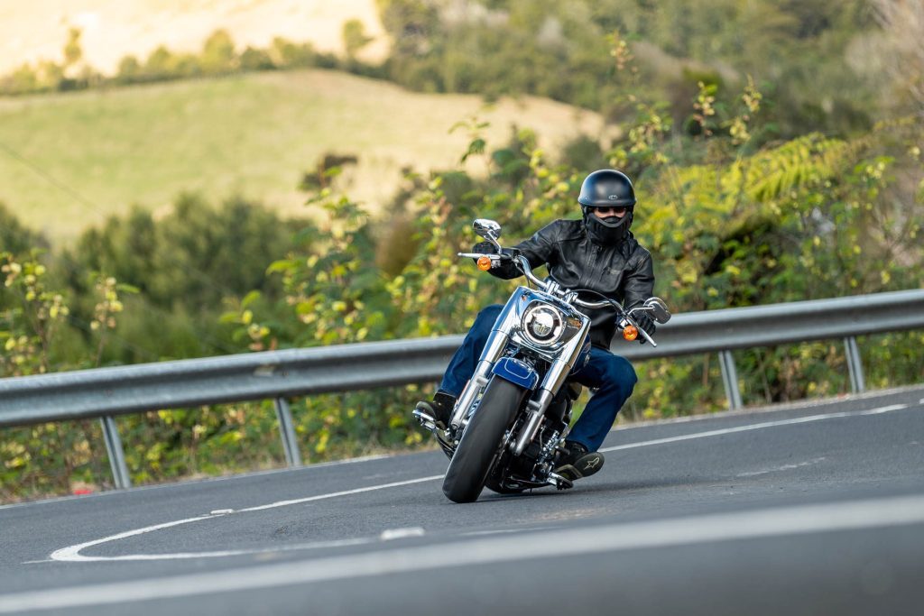 Harley-Davidson Fat Boy 114 takes a corner, showing lean angle