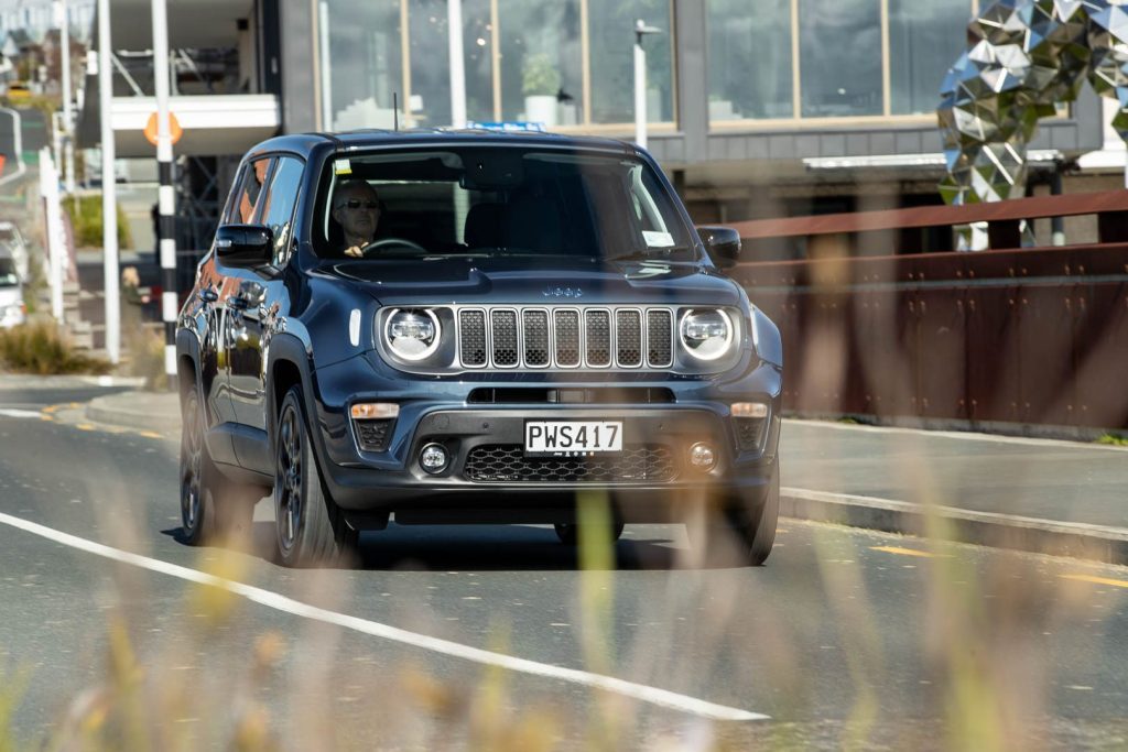 Jeep Renegade 4xe driving through Long Bay