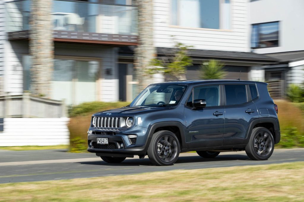 Dynamic drive-by view of the Jeep Renegade 4xe