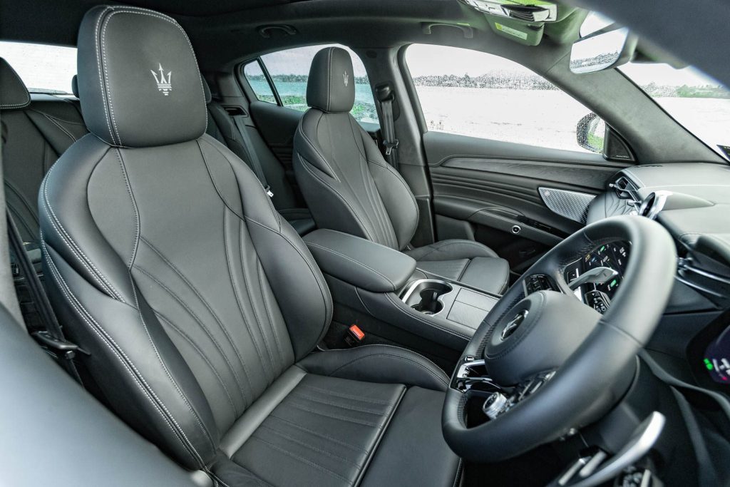 Front interior view of the Maserati Grecale Modena, with seats and steering wheel