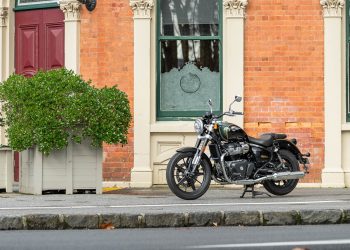 Royal Enfield Super Meteor 650 side profile in front of building
