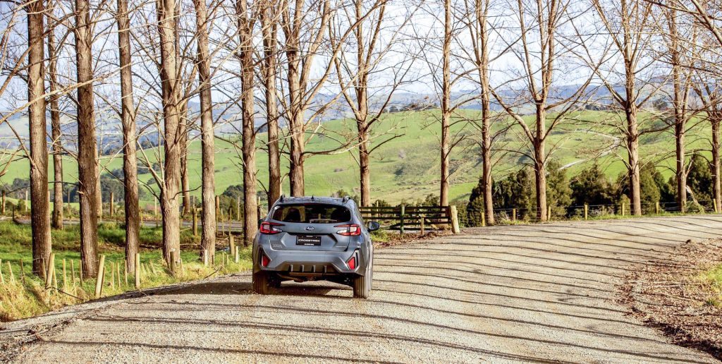 Moving shot of the Subaru Crosstrek on a gravel back road