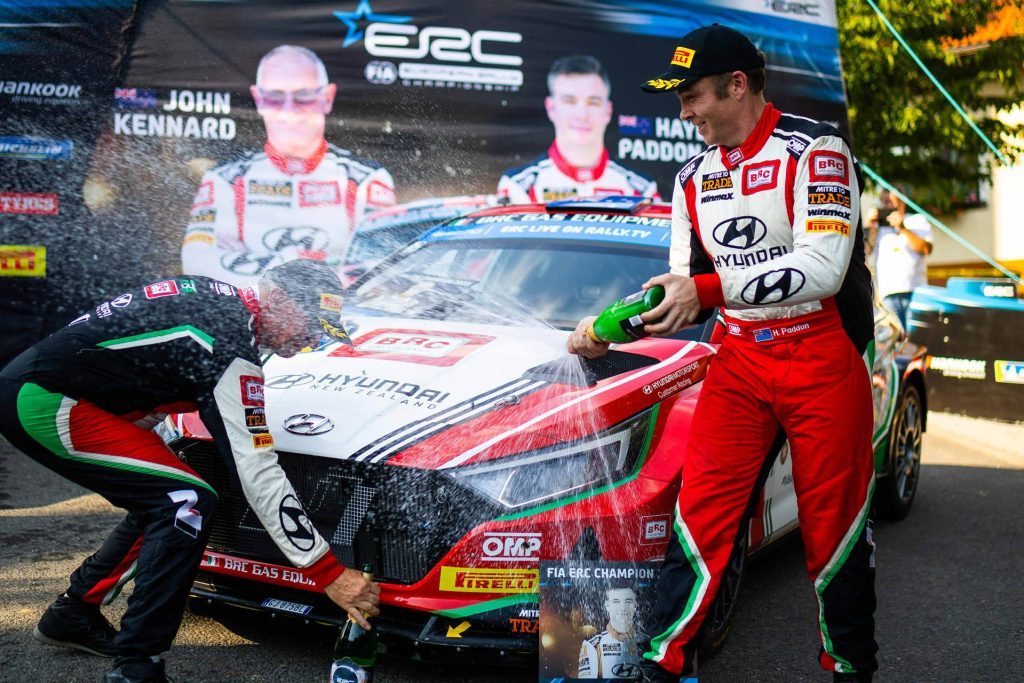 Hayden Paddon celebrating European Rally Championship win with John Kennard