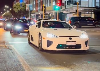 Lexus LFA driving down Quay Street in Auckland CBD