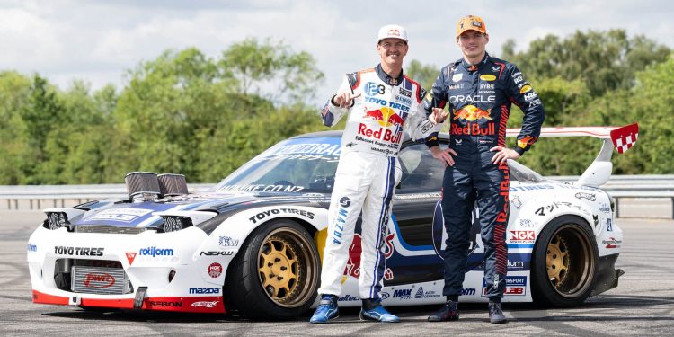 Mad Mike and Max Verstappen standing next to Mazda RX-7 drift car