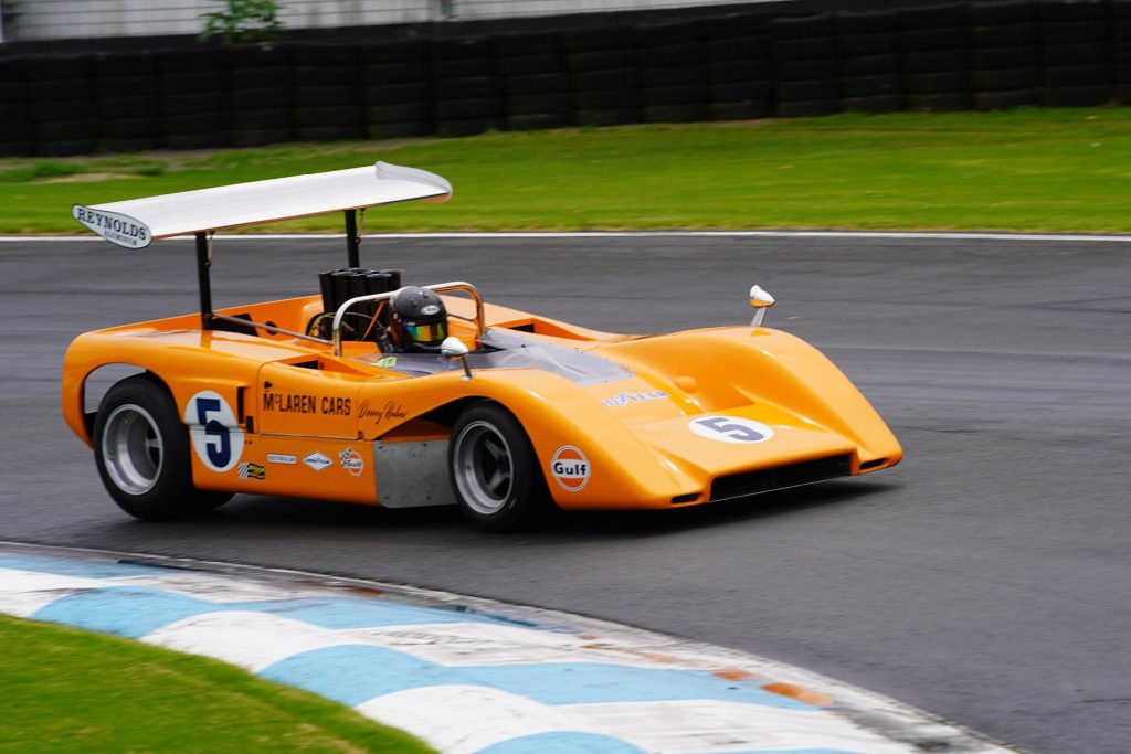 McLaren M8B driving on race track