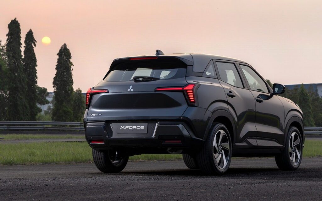Mitsubishi Xforce parked by trees