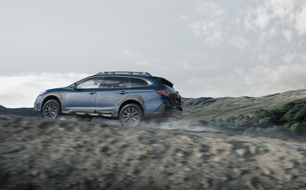 Subaru Outback XT Special Edition driving up hill
