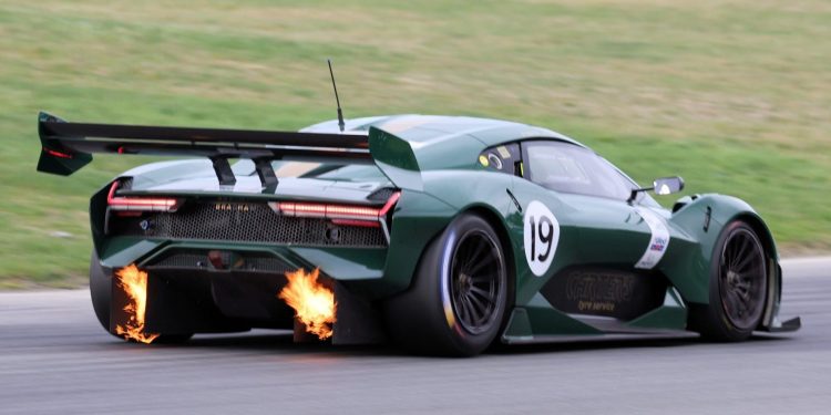 Brabham BT62 spitting flames while racing on track
