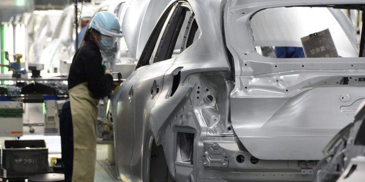 Person working on Toyota production lie