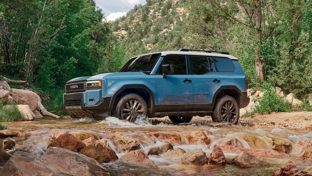 Toyota Land Cruiser Prado driving through river