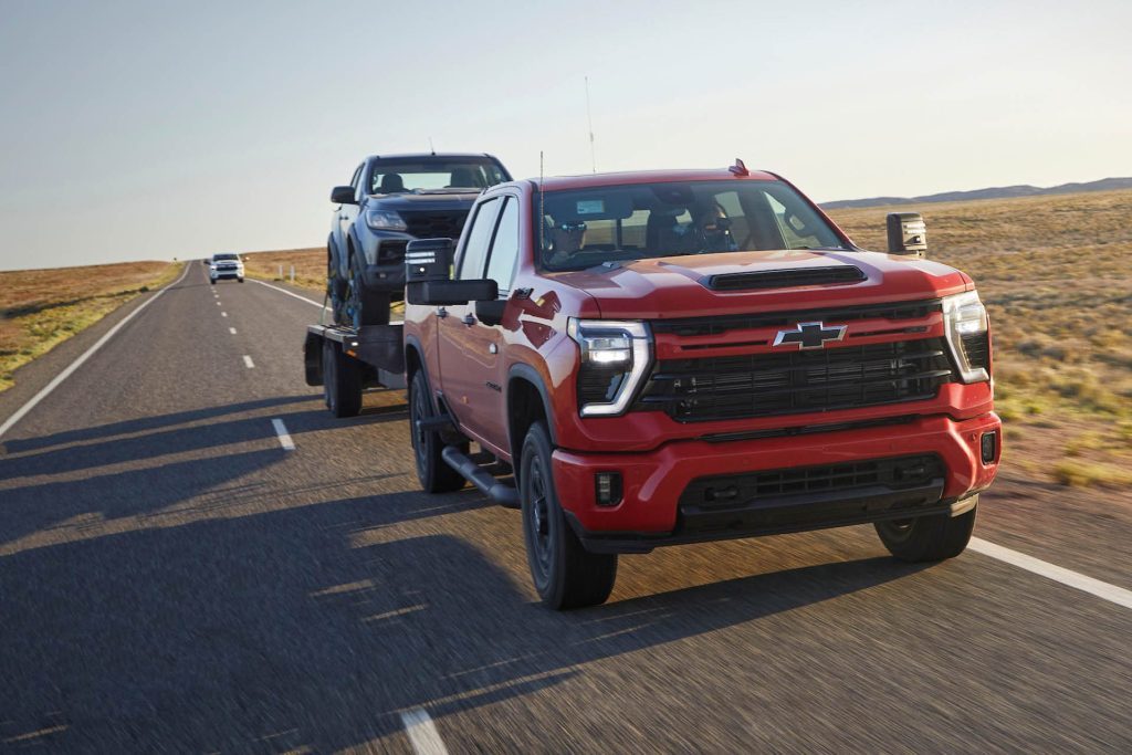 2024 Chevrolet Silverado HD towing Holden Colorado on trailer