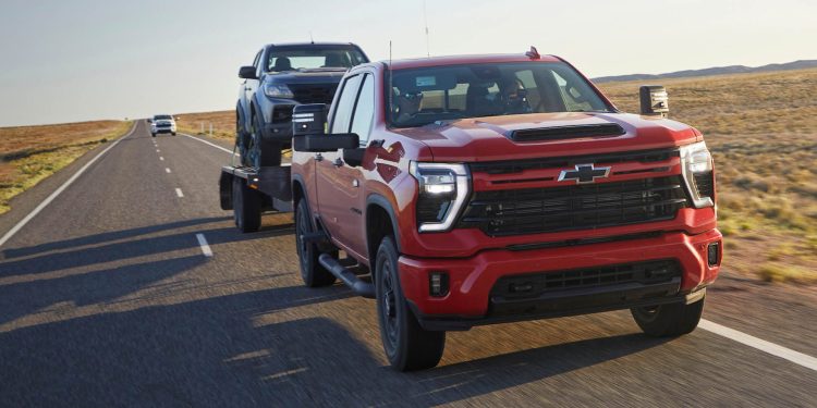 2024 Chevrolet Silverado HD towing Holden Colorado on trailer