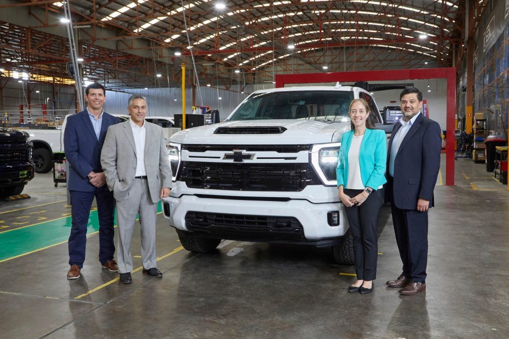 2024 Chevrolet Silverado HD on production line with executives