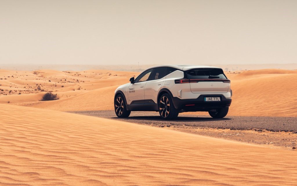 Polestar 3 driving on road through desert