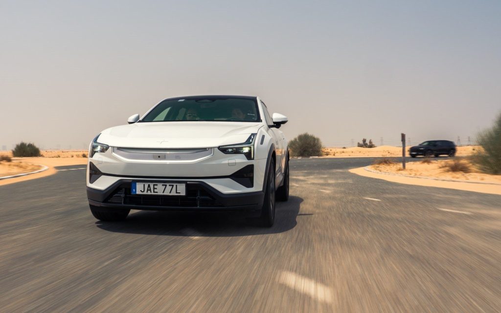 Polestar 3 driving around roundabout in desert