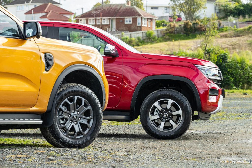 Ford Ranger and Volkswagen Amarok parked side by side, showing wheels