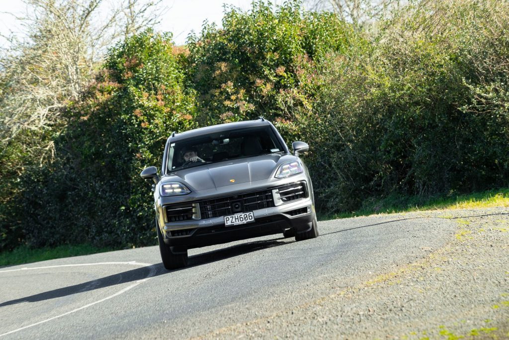 Porsche Cayenne front profile, while taking a corner