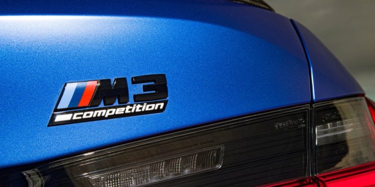 BMW M3 Competition badge close up view