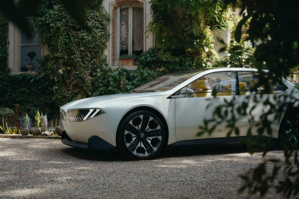 BMW Vision Neue Klasse parked by trees