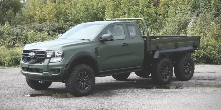 Ford Ranger HEX 6x6 by Ricardo, parked next to trees