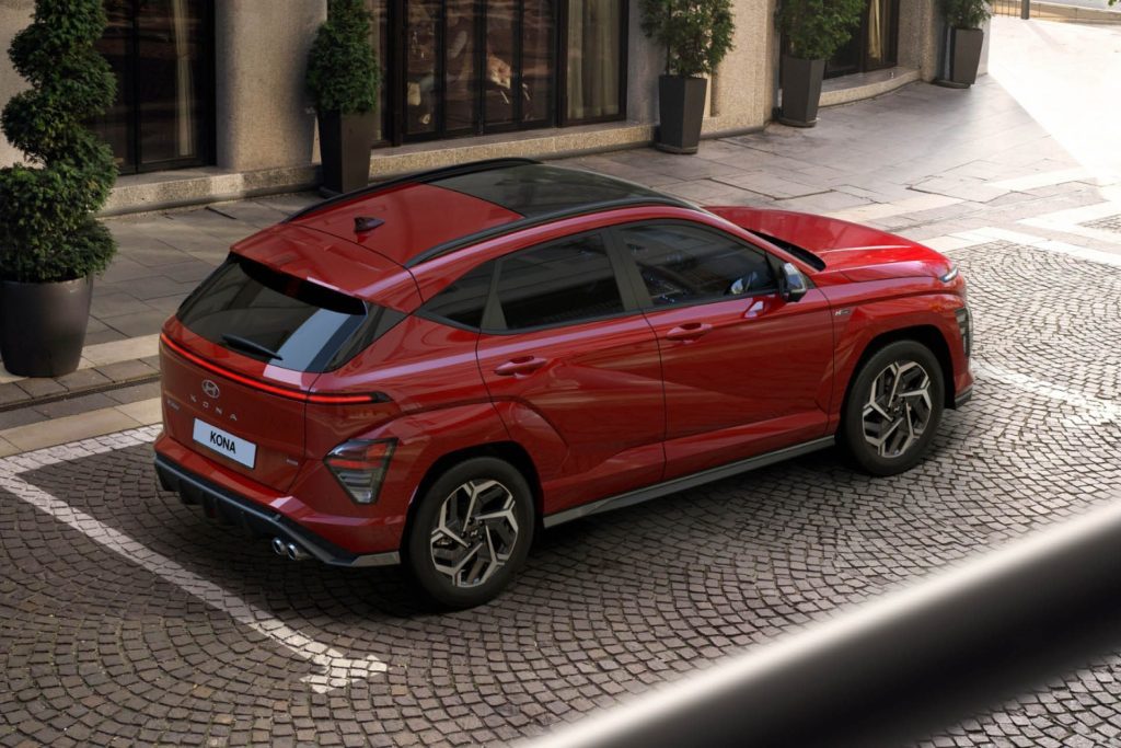 Hyundai Kona in red rear three quarter view