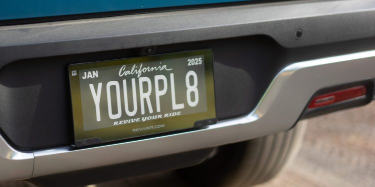Reviver digital number plate on blue car