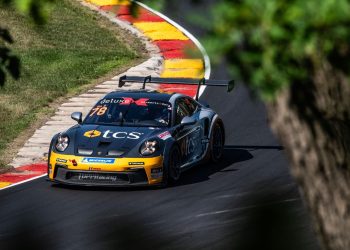 Porsche Carrera Cup car racing around corner in America