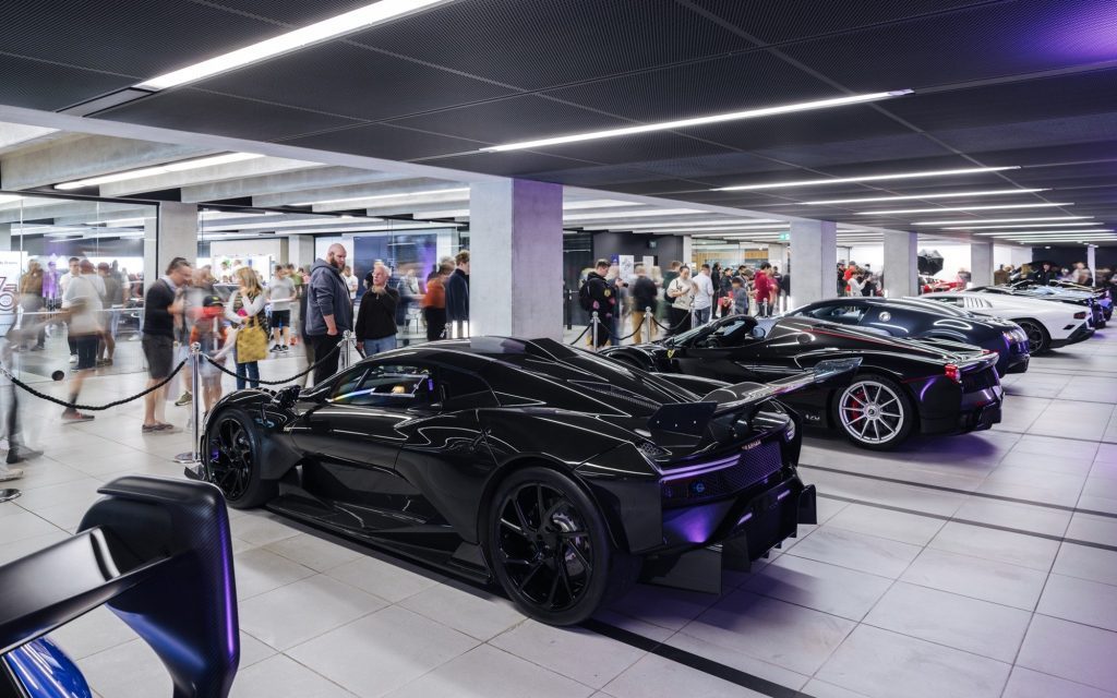Crowd viewing hypercar line-up at 2023 Starship Supercar Show