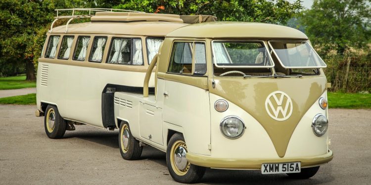 Volkswagen Type 2 and camper trailer front three quarter view