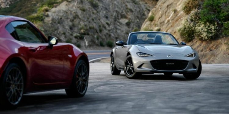 Two 2024 Mazda MX-5 ND facelifts parked on side of road