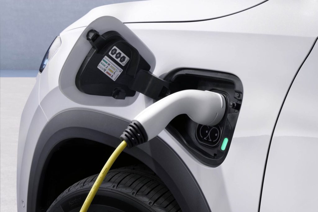 2024 Skoda Kodiaq plug-in hybrid plugged in to charger