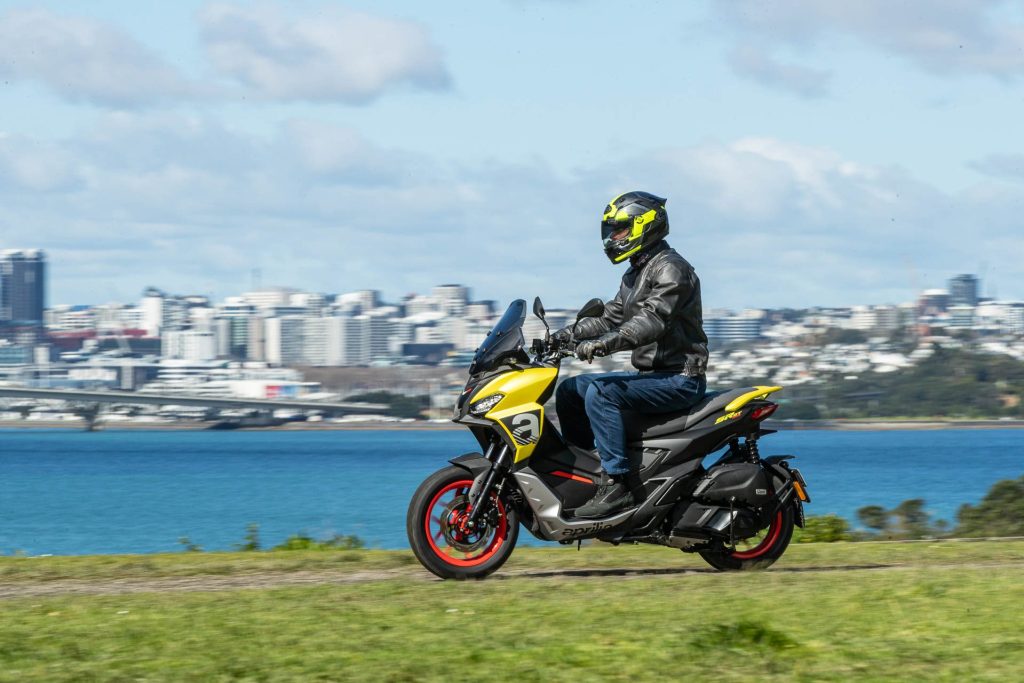 Aprilia SR GT 200 riding on gravel