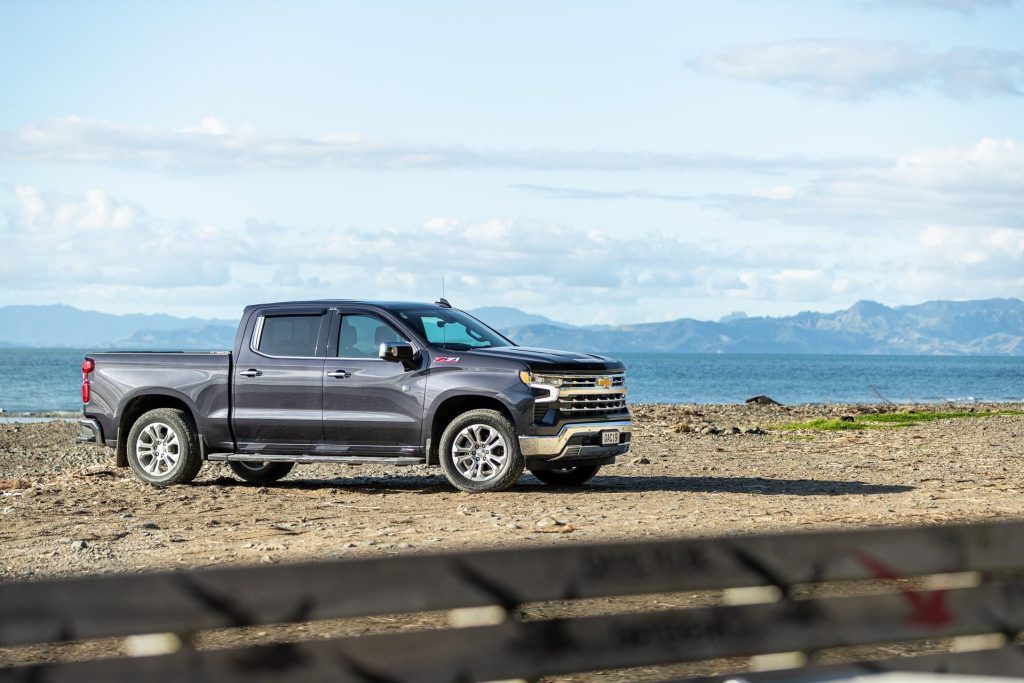 Chevrolet Silverado 1500 LTZ Z71 front quarter angle, shot on a beach