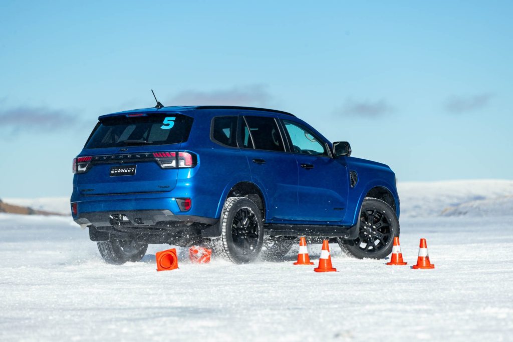 Ford Everest drifting around cones